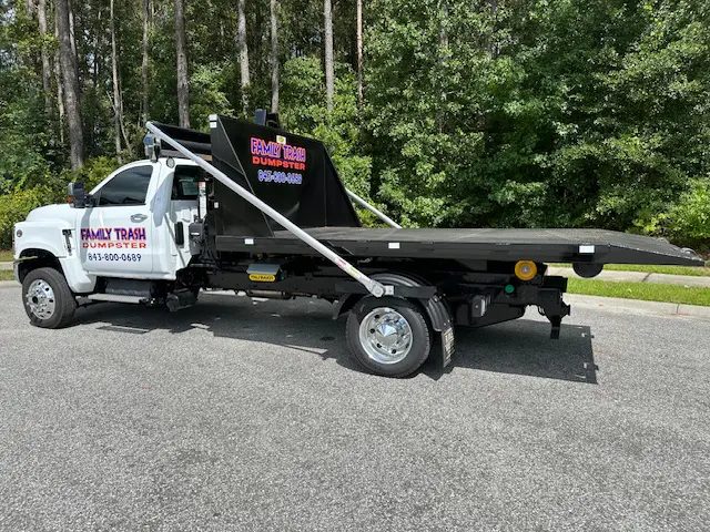 Family Trash 14-foot flatbed truck