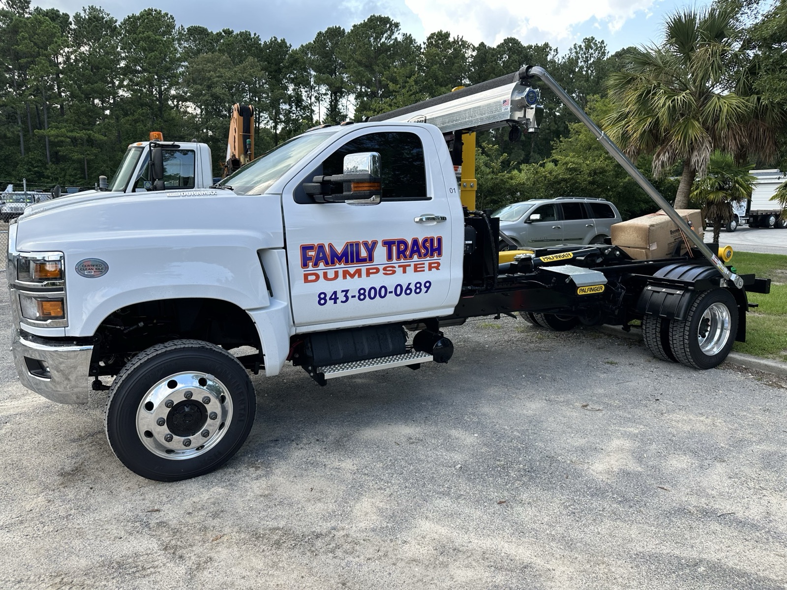 The Family Trash roll-off truck in Charleston